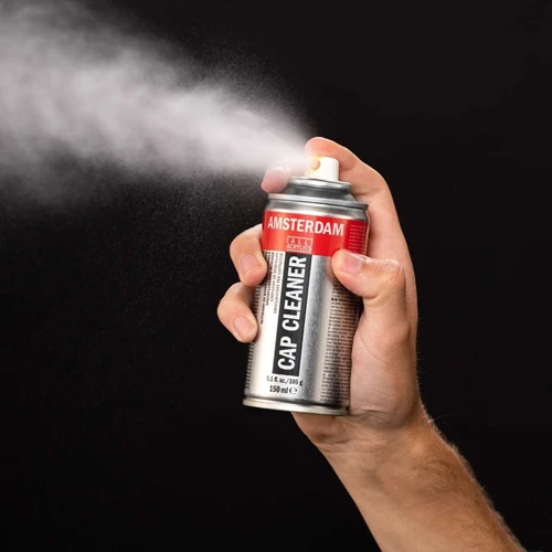 Hoe kan ik voorkomen dat de cap van mijn spuitbus verstopt raakt?